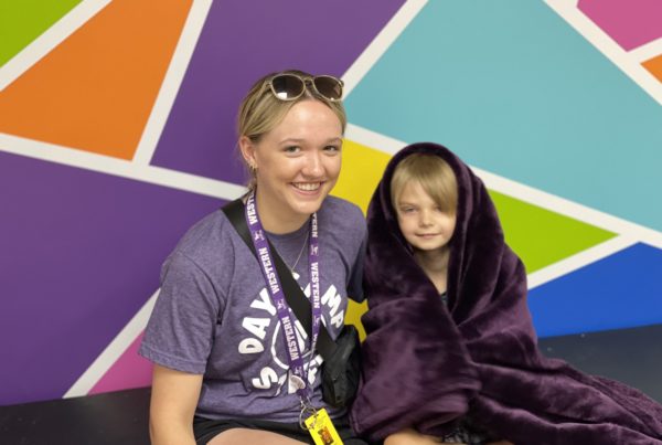 The United Way funds the Autism Summer Campaign, and three Youth Resource Houses in Sarnia provided by the Sarnia Family YMCA.  Summer Autism Camp Counsellor, Taylor, works with Lucas, a summer camp camper