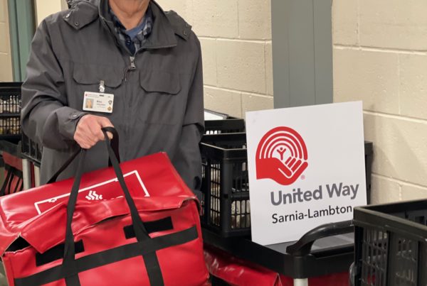 Volunteer Mike Shimmin prepares to deliver meals to seniors and people with disabilities in Sarnia through the Canadian Red Cross Meals on Wheels program.